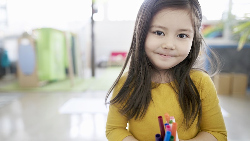 Early care in Billings, young girl in yellow shirt, 1 column