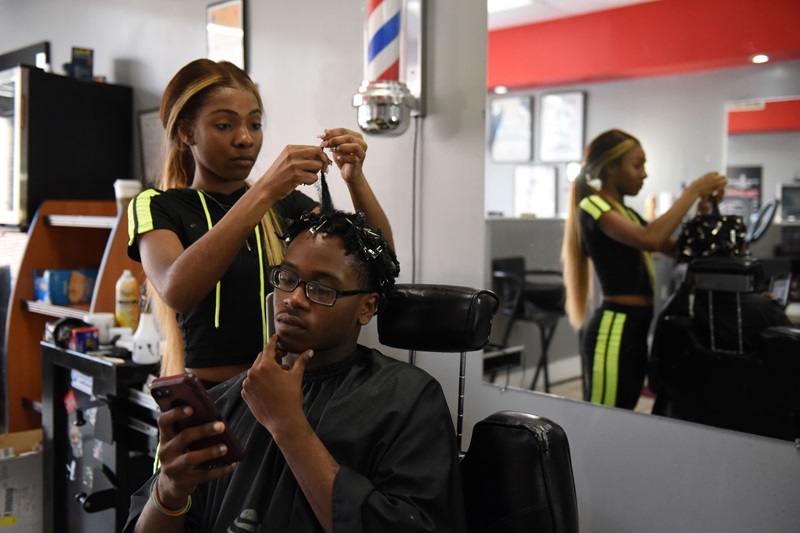 Barber doing hair