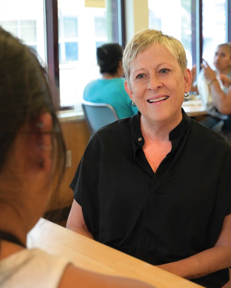 Photo of woman talking with someone